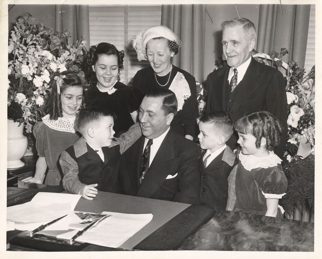 Miniature of Richard J. Daley with his family at his installation as Director of Revenue
