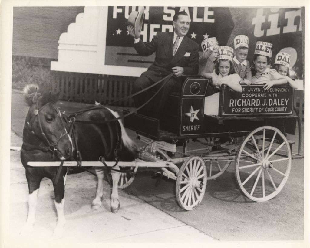 Richard J. Daley in a pony cart with his children