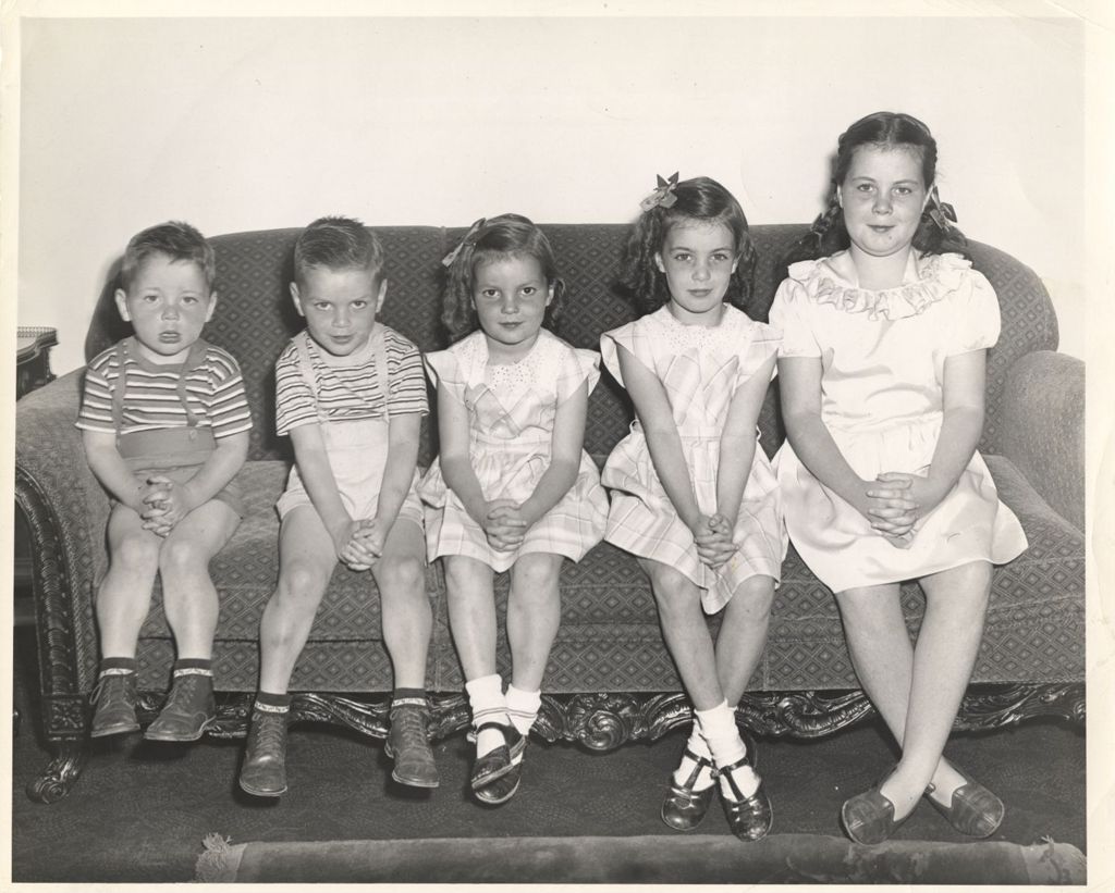 Miniature of Daley children on a sofa