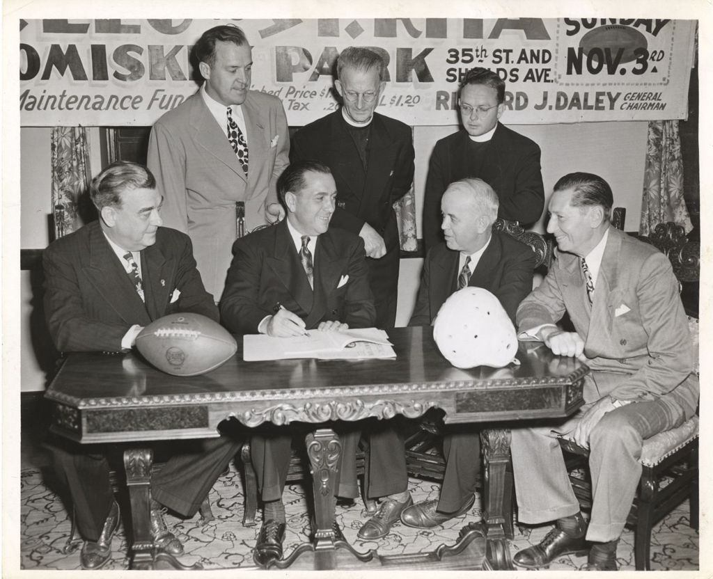 Miniature of Richard J. Daley and others promote a charity football game