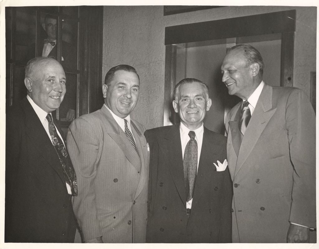 Richard J. Daley with three other men