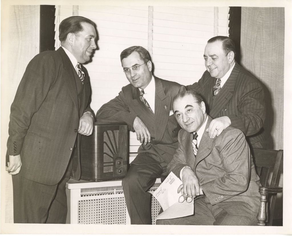 Miniature of Richard J. Daley and others listening to the radio