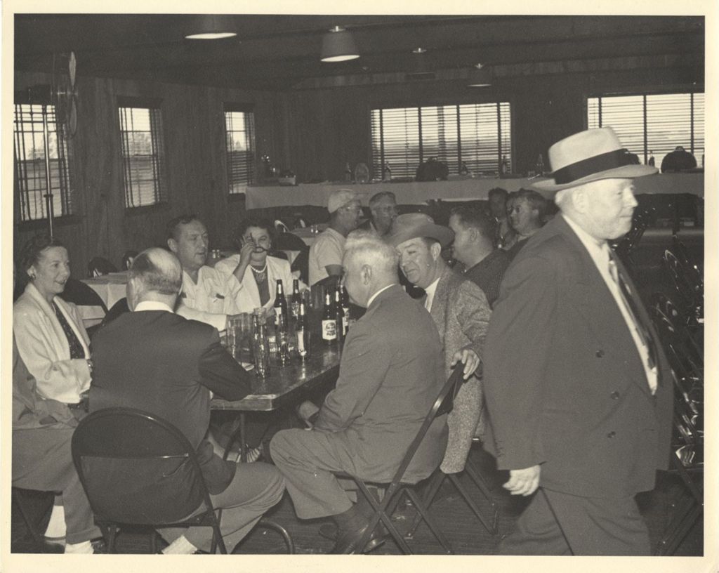 Group seated around a table at the Hamburg Club