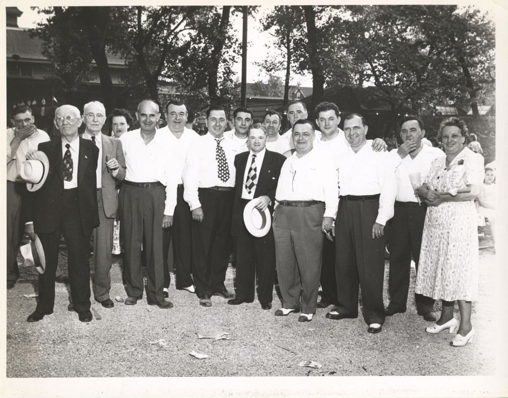 11th Ward picnic, Richard J. Daley with a group of people