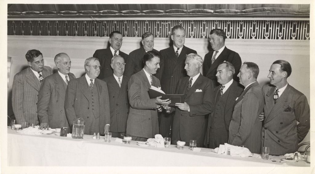 Presentation at a banquet, Richard J. Daley and others