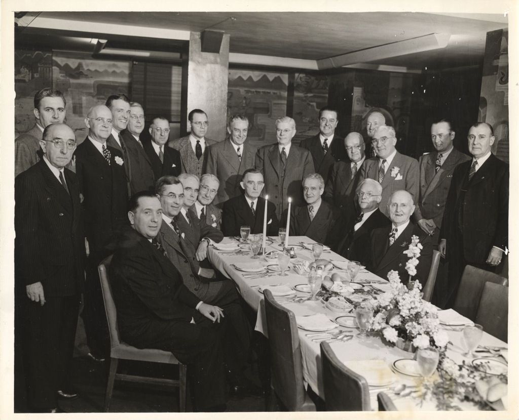 Group of Illinois legislators at banquet table