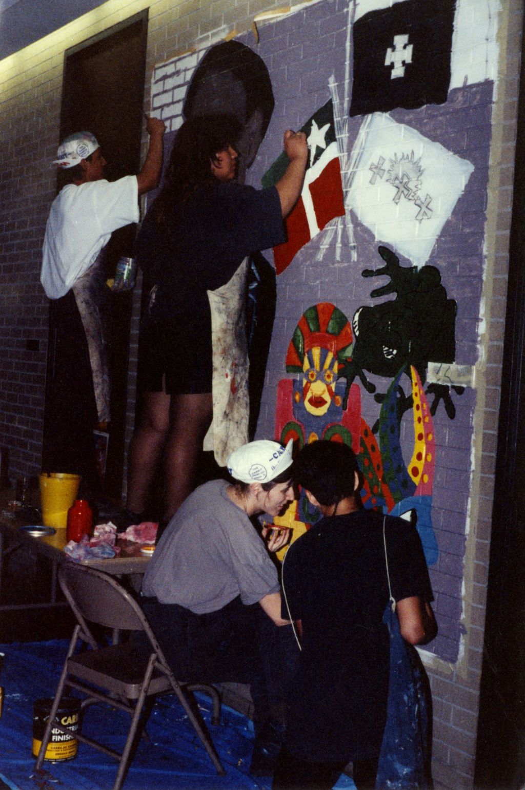Miniature of Students painting a mural