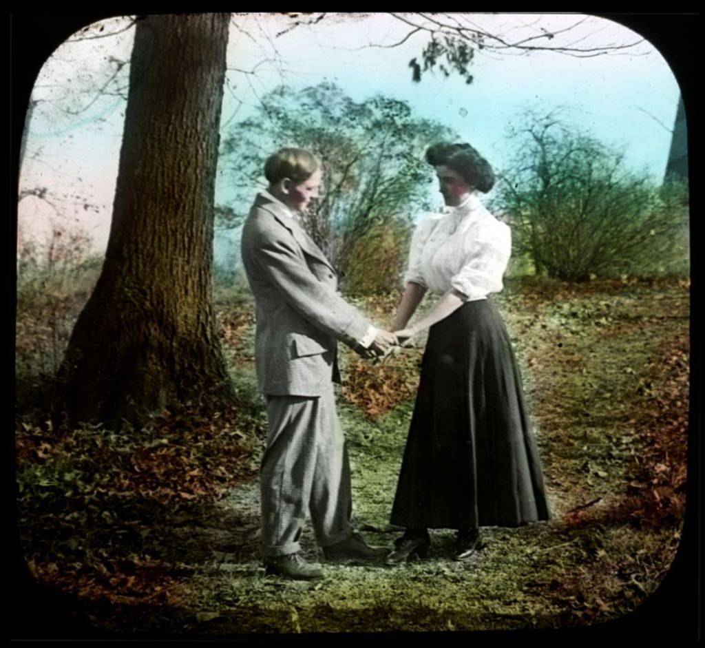 Unidentified painting of a couple standing in a park.