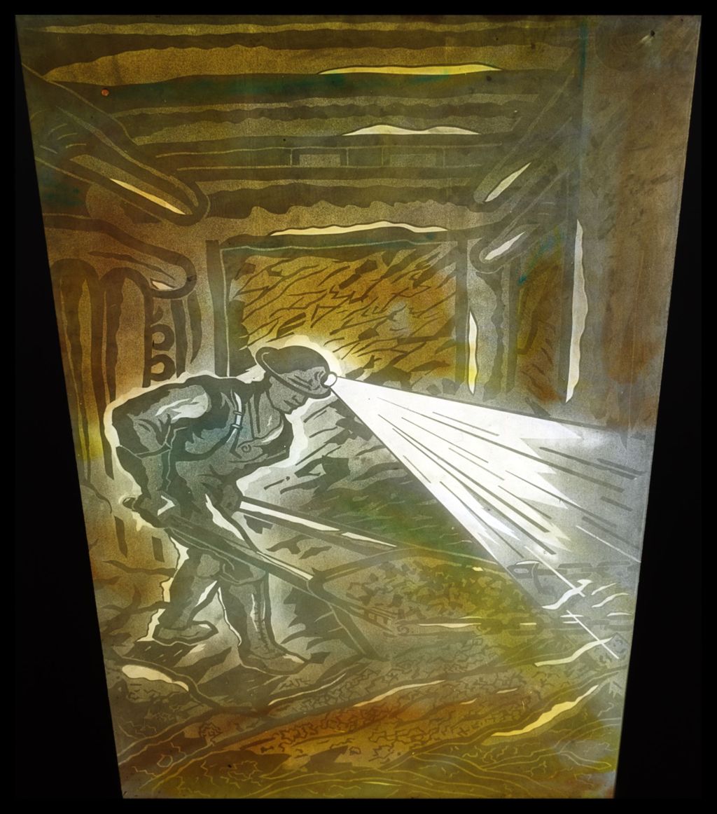 Miniature of Mural of a coal miner working in a mine shaft