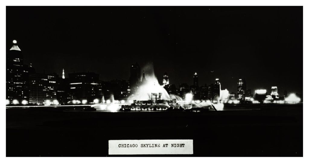 Miniature of The Chicago skyline at night with Buckingham Fountain in the foreground.