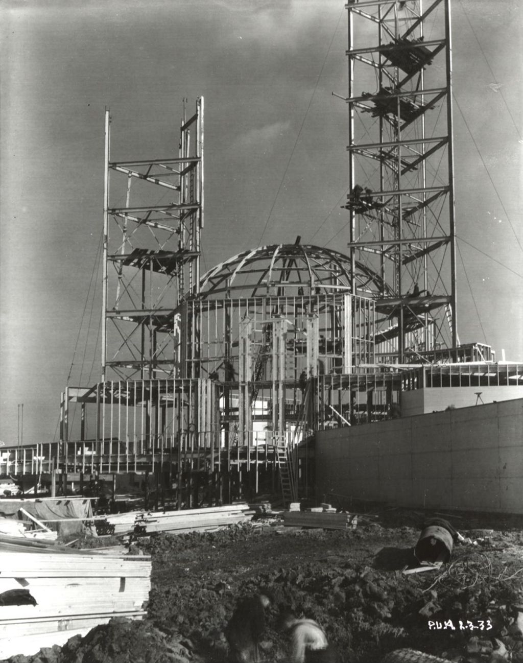 Construction of the Federal Building on Northerly Island adjacent to the Court of States exhibit.
