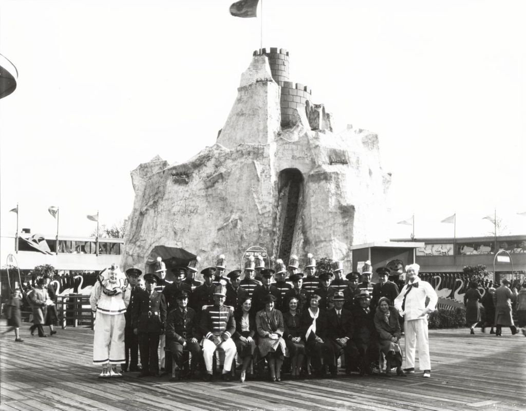 Miniature of Security guards from A Century of Progress pose for a group photograph at the Enchanted Island exhibit.