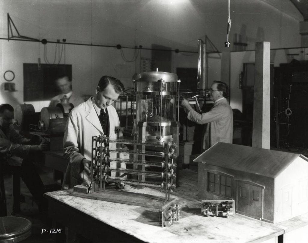 Miniature of Technicians construct a model petroleum refinery for exhibition at A Century of Progress.