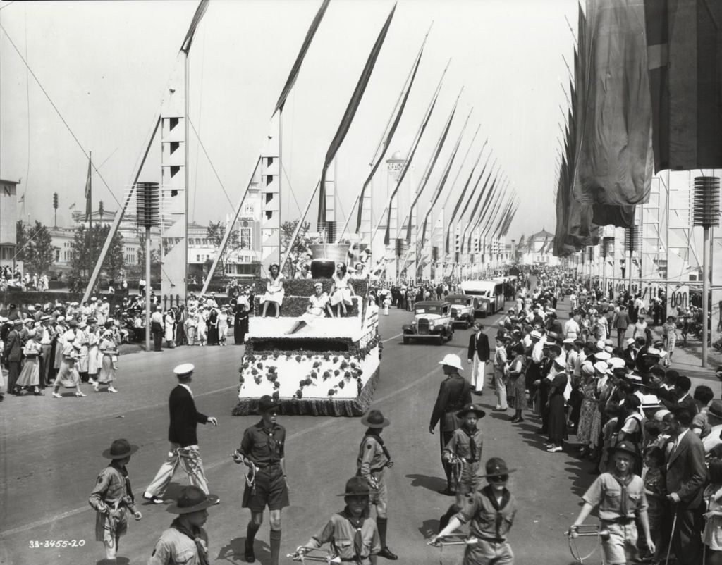 Miniature of Walgreen's float parading down the Avenue of Flags