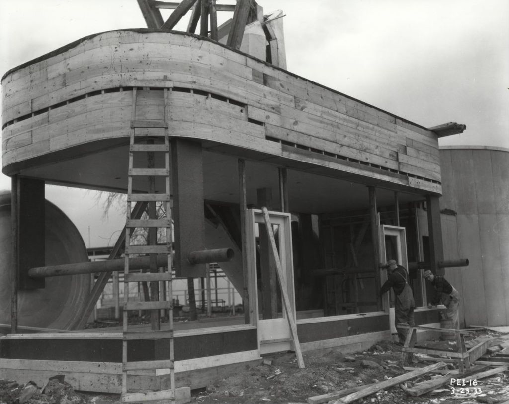 Construction of a giant toy wagon in preparation for the Enchanted Island exhibit