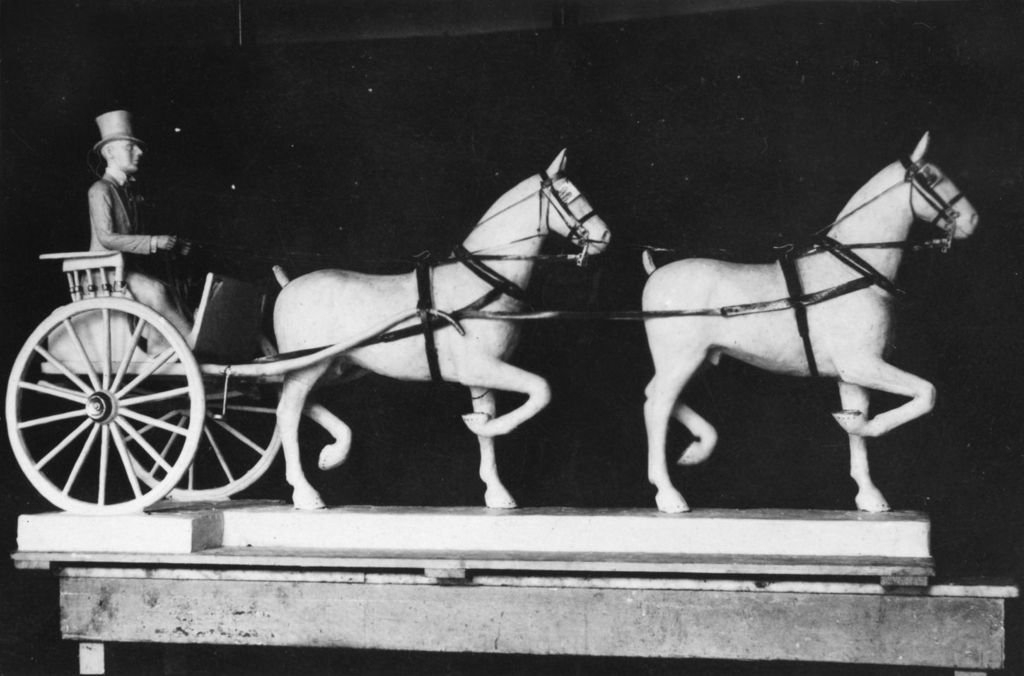 Miniature of This miniature horse-drawn carriage by artist Wilbur Freece, known as The Tandem, is made from beef suet.