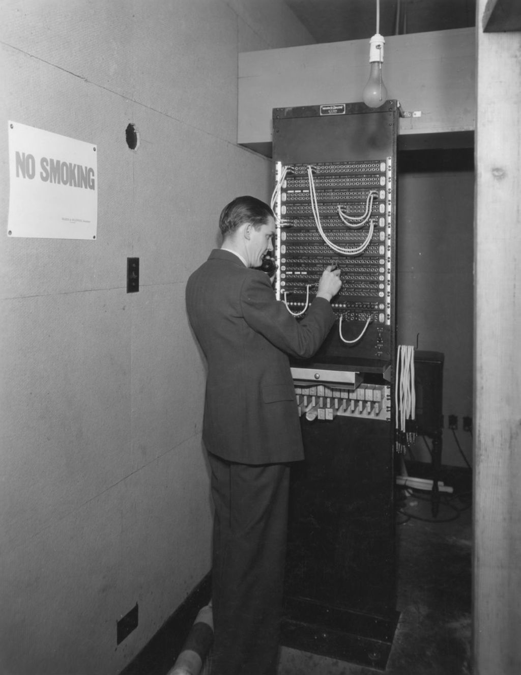 Miniature of Nan operating a Western Electric telephone switchboard
