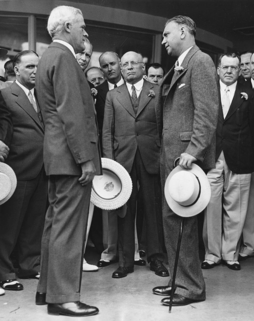 Thomas E. Wilson (left), chairman of the board of directors of Wilson and company, shown presenting the Wilson exhibit building to the World's Fair administration