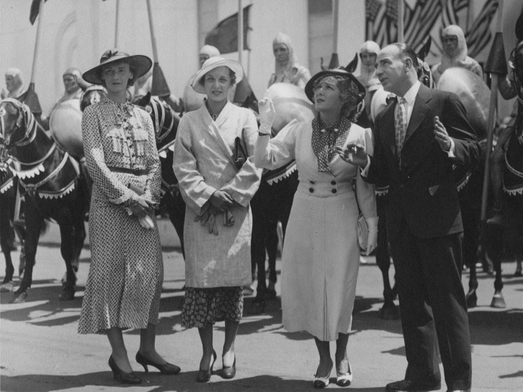 Women tour in front of the Administration building