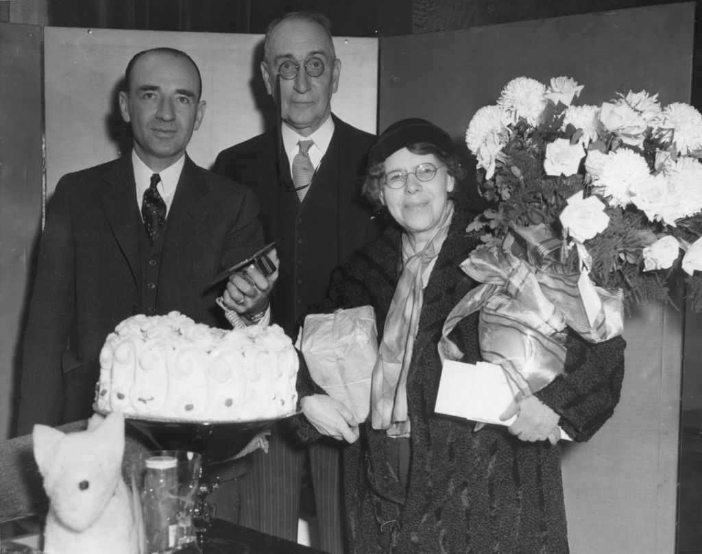 Fair officials with last millionth visitor on the last day of the World's Fair