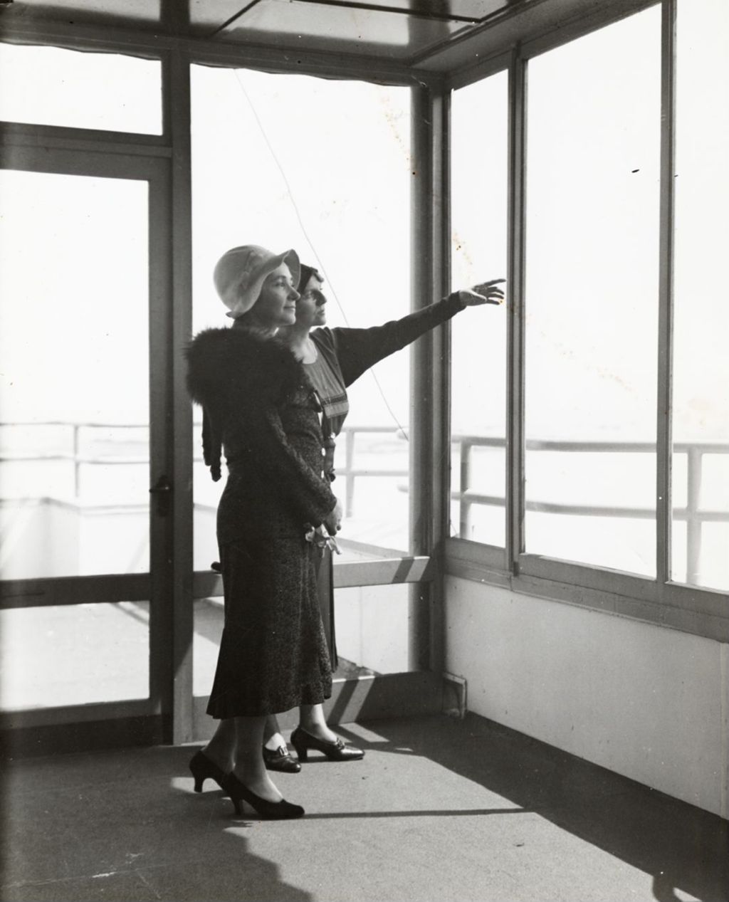 Miniature of Two women viewing the Century of Progress from the observation deck of the Skyride.