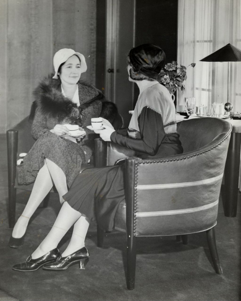 Unknown photograph of two women having tea at A Century of Progress International Exposition.