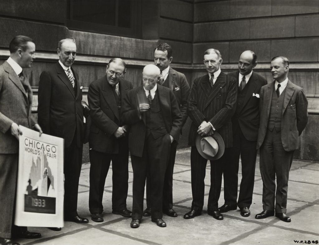 Miniature of Fair dignitaries review the Century of Progress publicity poster for 1933