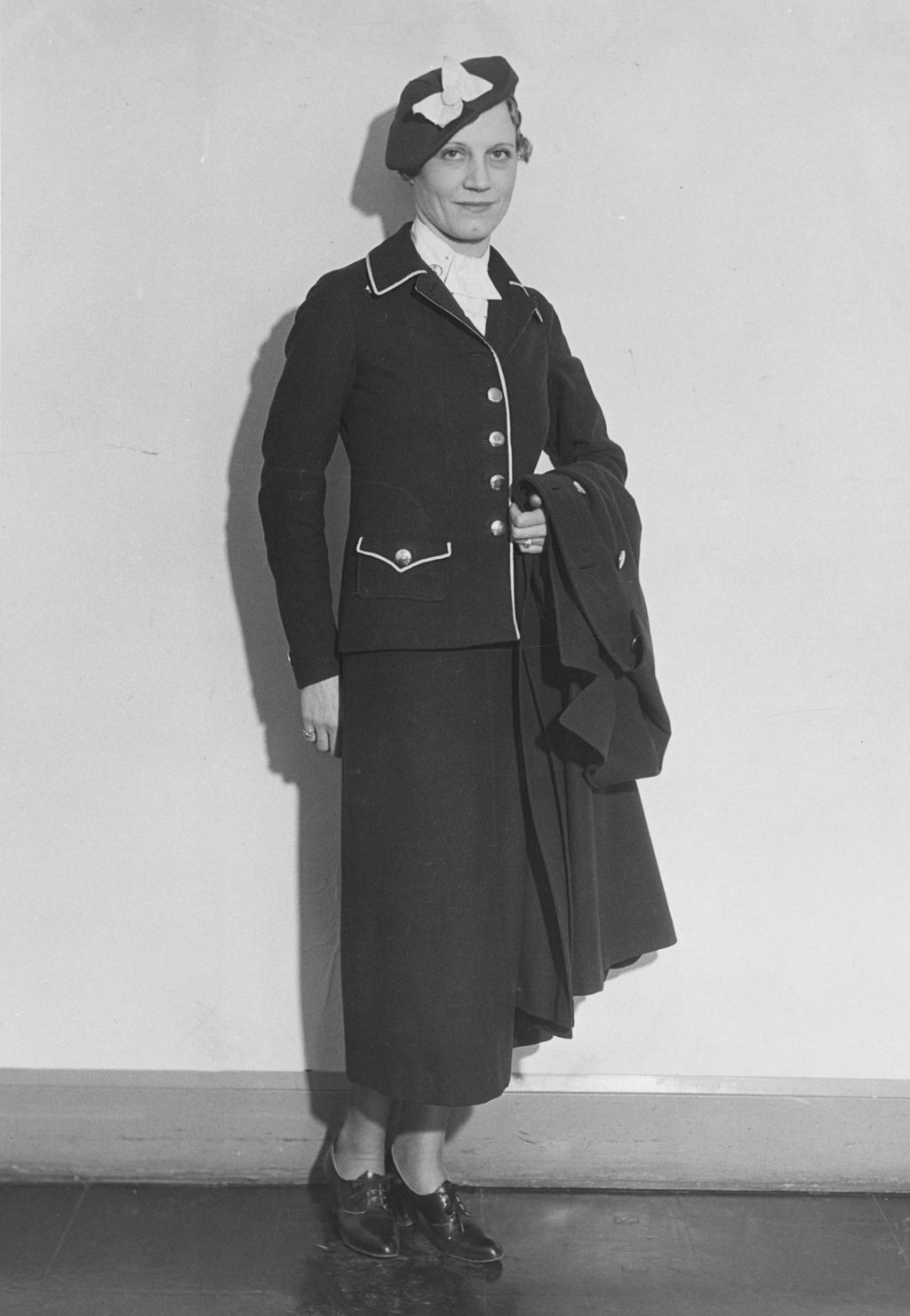 Woman models cashier uniform