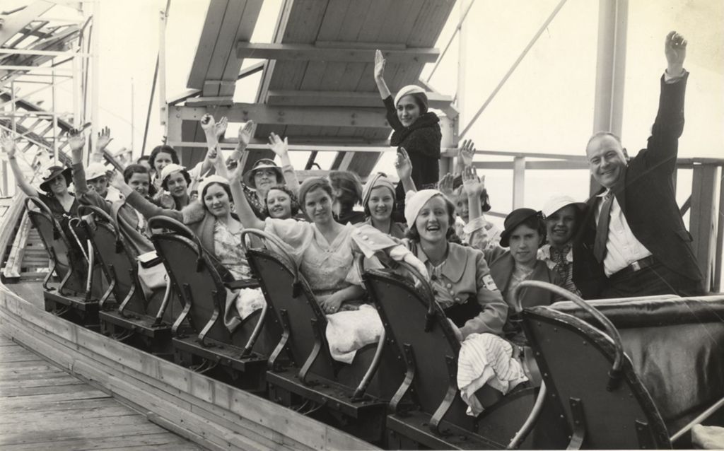 Miniature of Group of school-girls from St. Thomas, Ontario, enjoy the thrills of the safety coaster during their visit