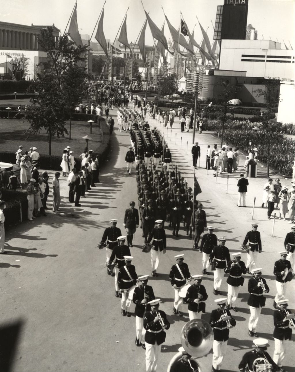 Veterans of the Spanish American War parade up to the 16th St. bridge from the Avenue of Flags