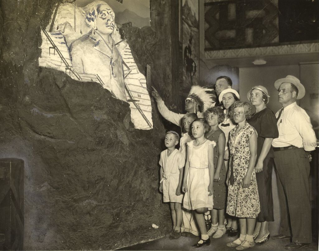 Miniature of Residents of South Dakota visit their state exhibit in the Court of States