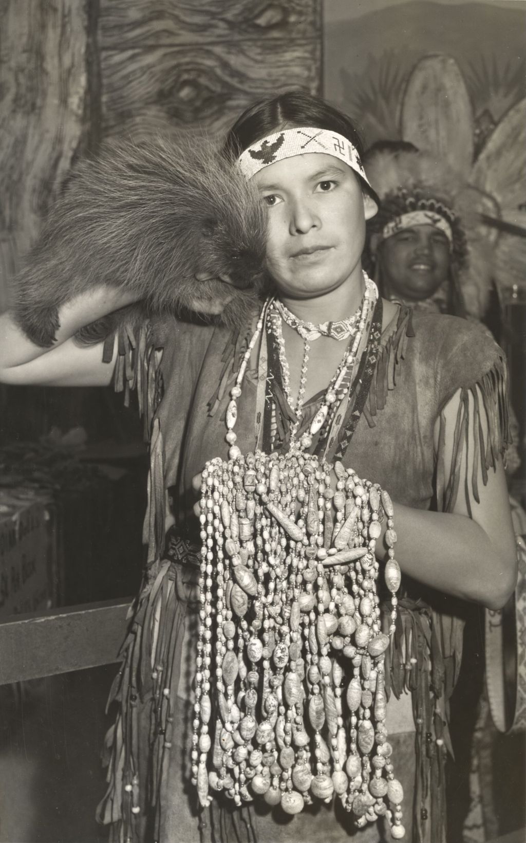 Miniature of Native American Indian at the South Dakota exhibit
