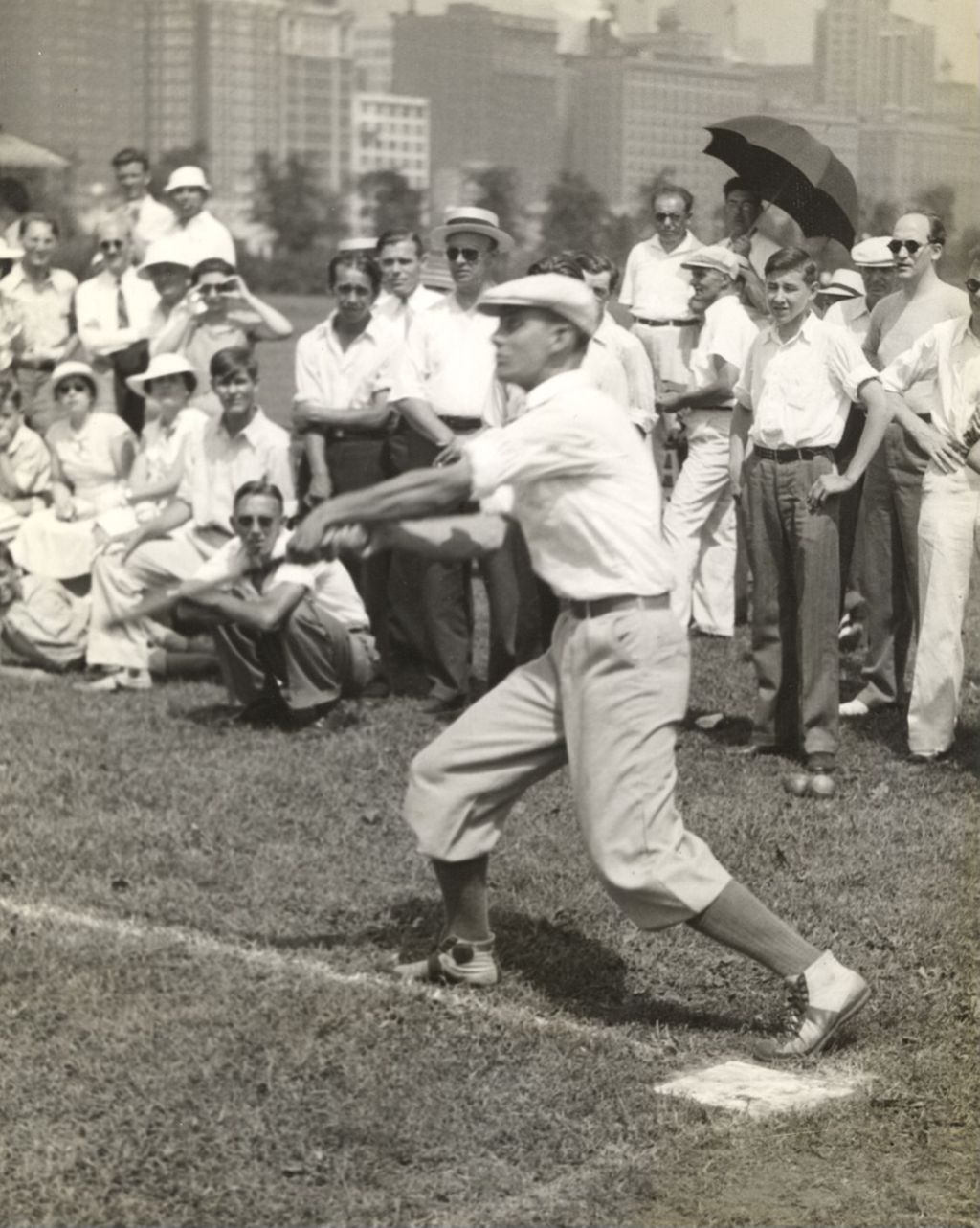 Miniature of A batter playing in a softball game between the Chicago Symphony Orchestra and the Detroit Symphony Orchestra