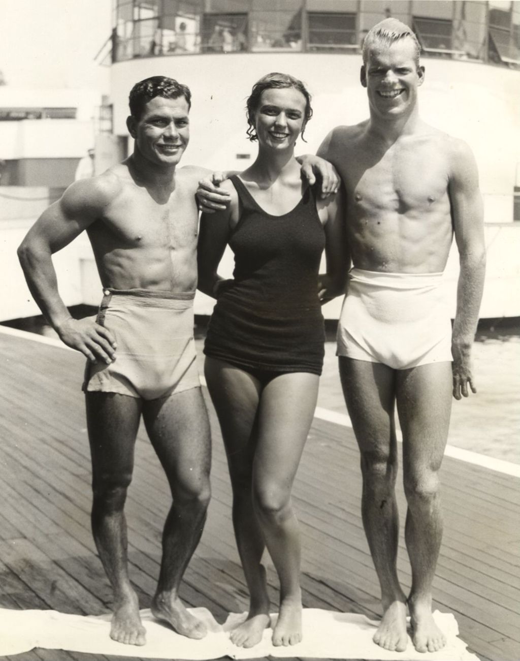 Beauty contest winner with famous swimmers