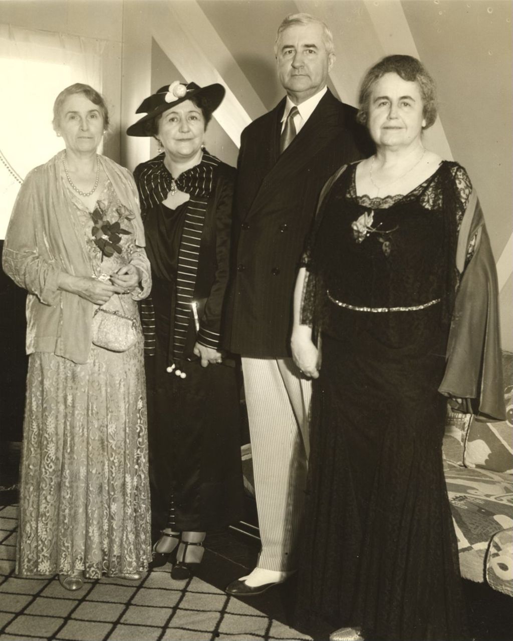 Miniature of Jesse H. Jones, chairman of the Reconstruction Finance Corporation, and Mrs. Jones visit the World's Fair, accompanied by Mrs. Woodrow Wilson.