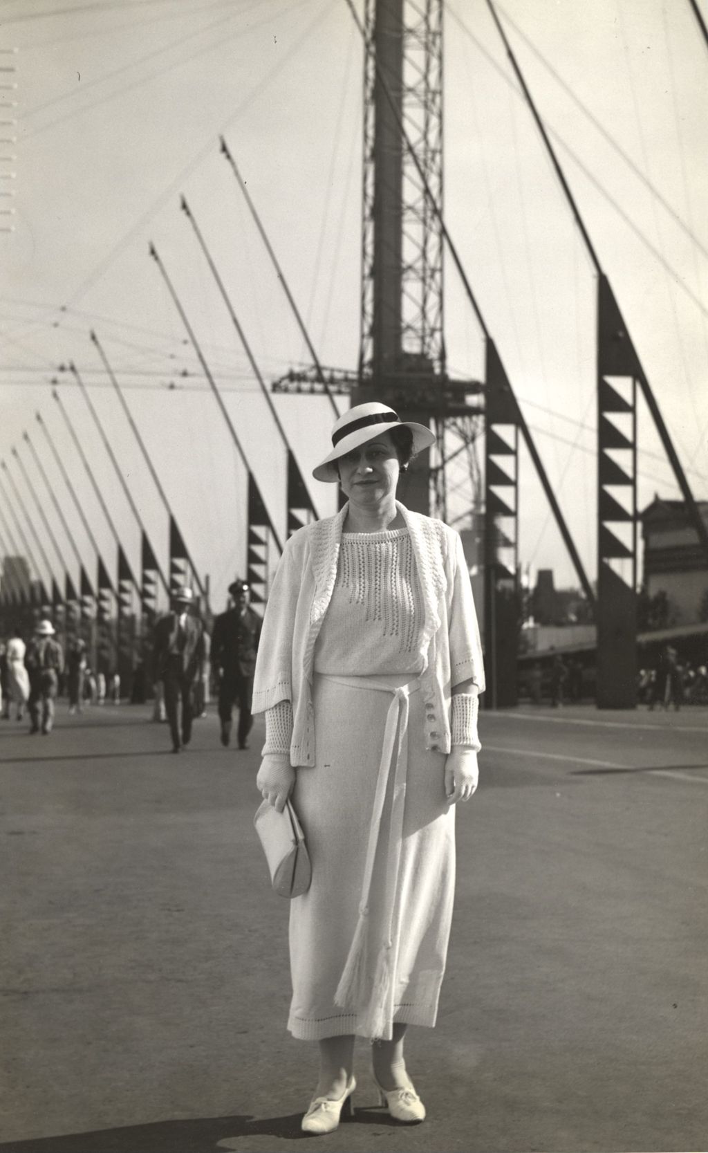 Miniature of Singer Laura T. Martin posing in front of the Century of Progress Avenue of Flags.