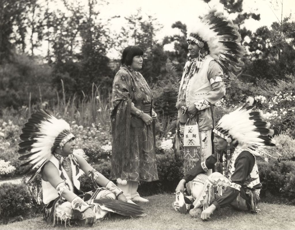 William P. Wilkerson (Cherokee), president of the Indian Council Fire, confers with peers