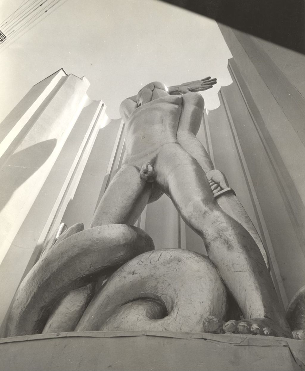 Miniature of Sculpture of 'Man Combating Ignorance' on the north approach to the Hall of Science viewed from below