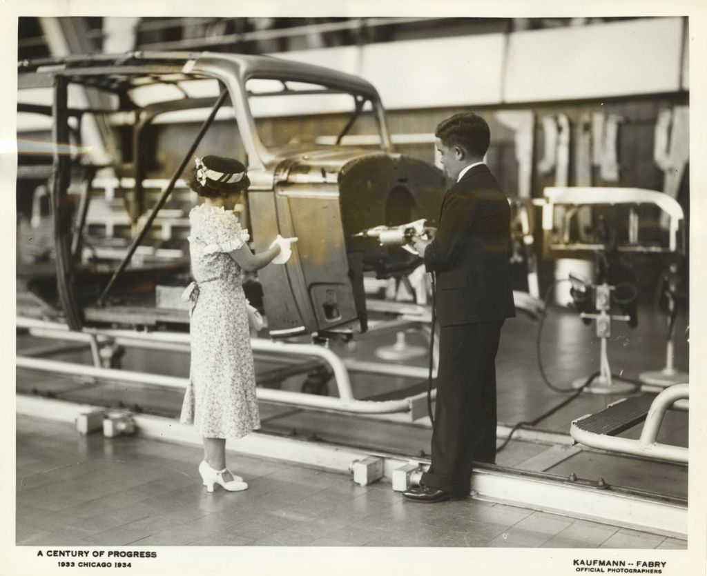 Miniature of Young couple work on the Chevrolet Assembly line