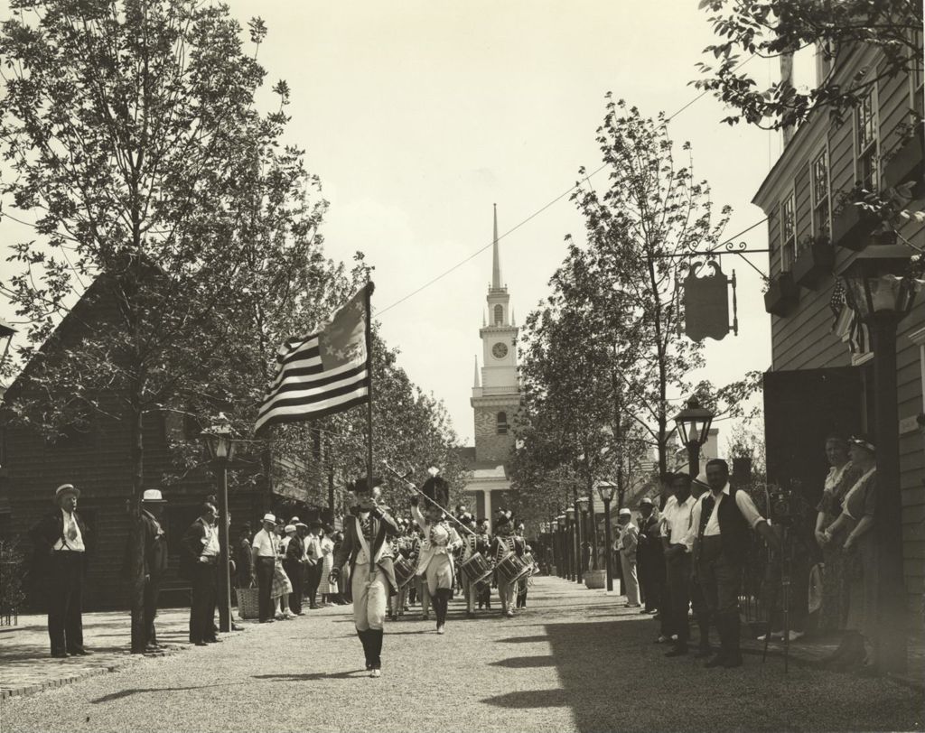 Colonial American military reenactors on parade in Colonial Village