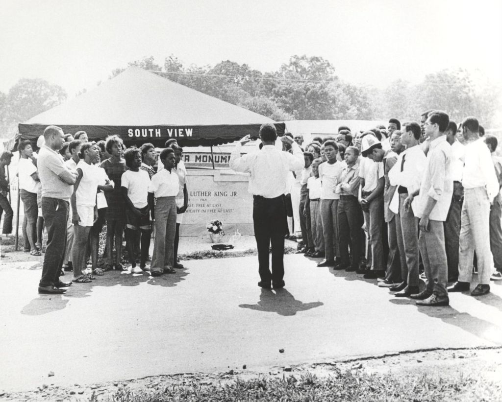 Miniature of People singing at Martin Luther King, Jr.'s grave