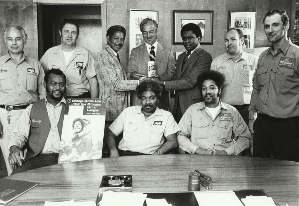 Miniature of James Compton with beer company employees
