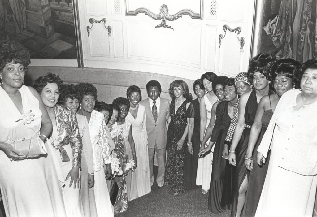 Miniature of Freda Payne and James Compton with a group of women