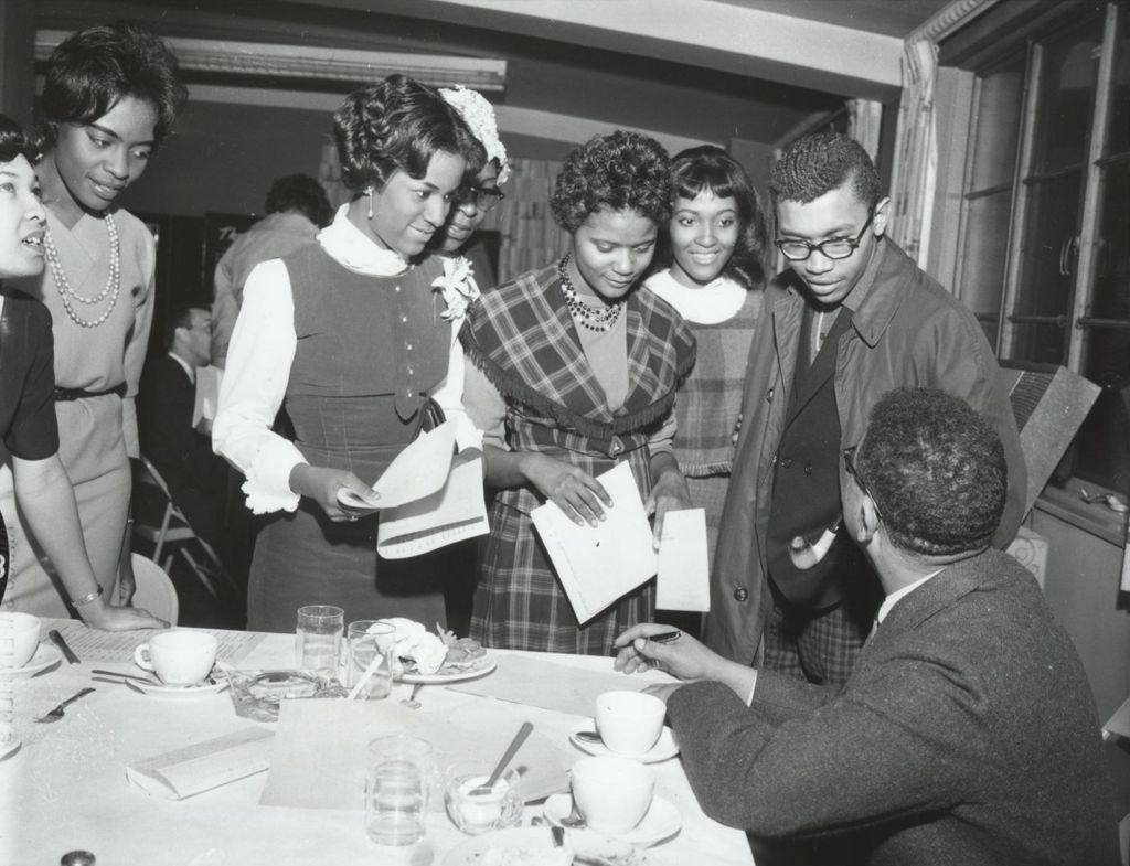 Miniature of Dizzy Gillespie with a group of young people