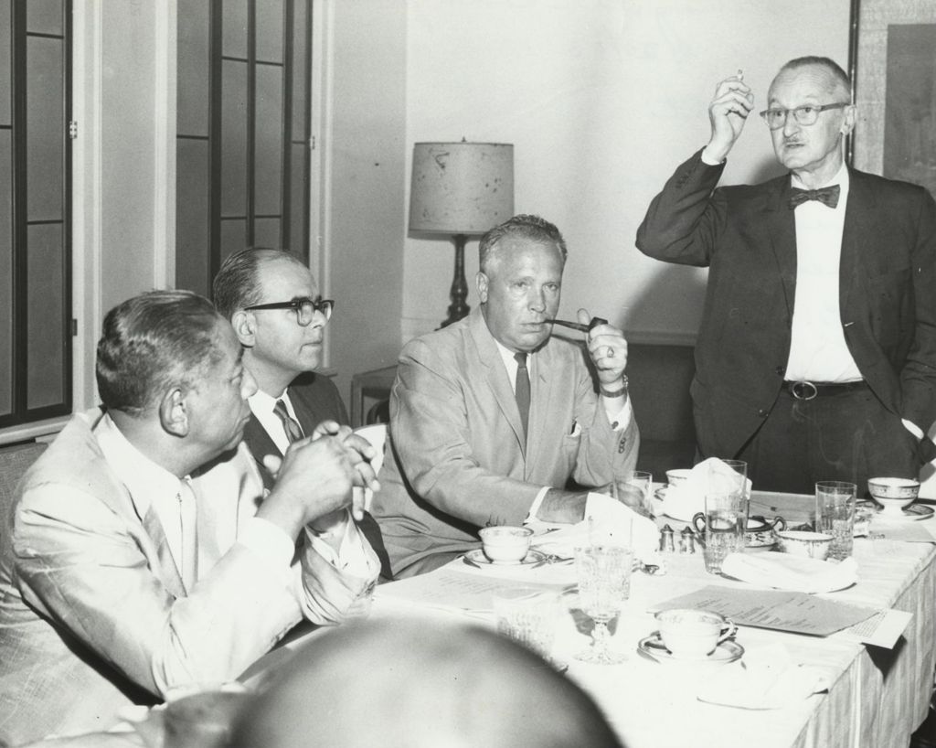 H. B. Law speaks at a Board meeting, 1963