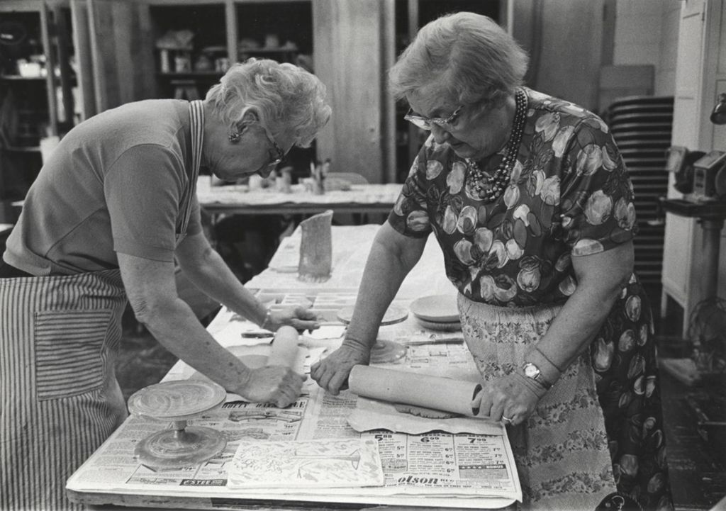 Miniature of Two senior women rolling dough
