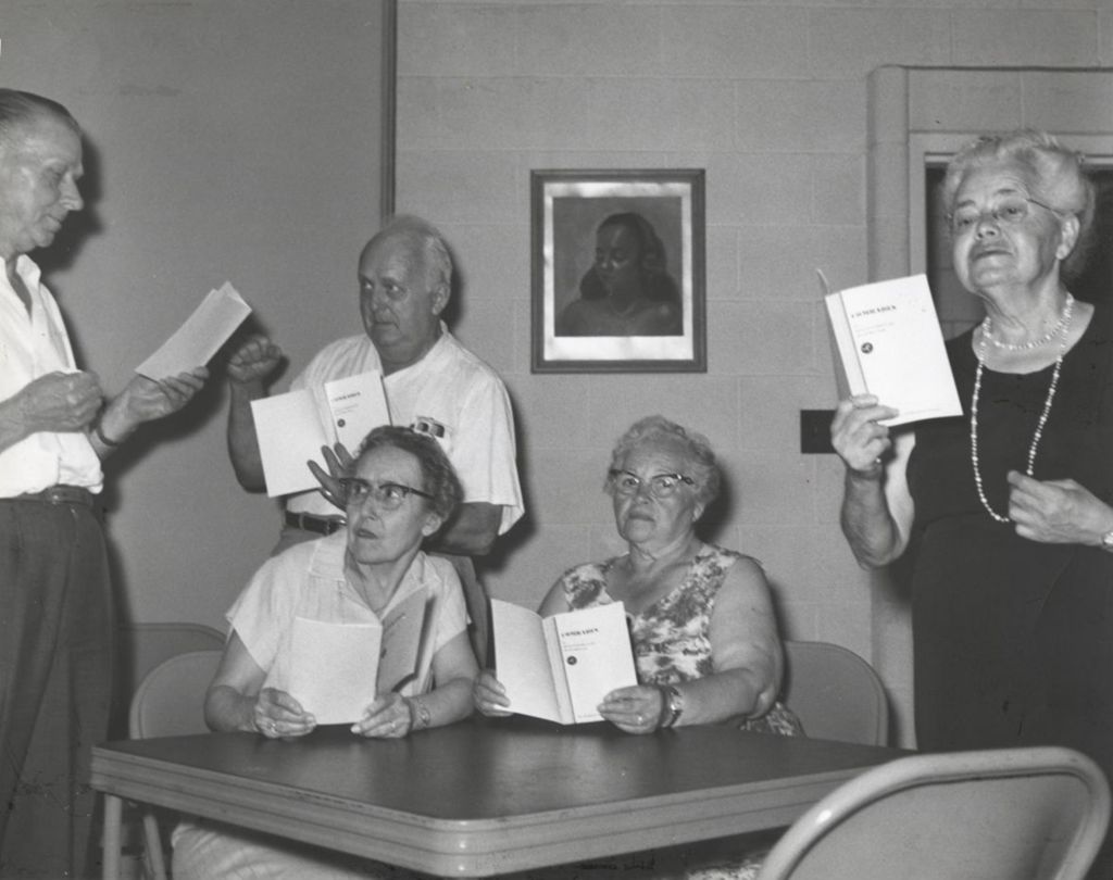 Seniors in a drama group reading through a play