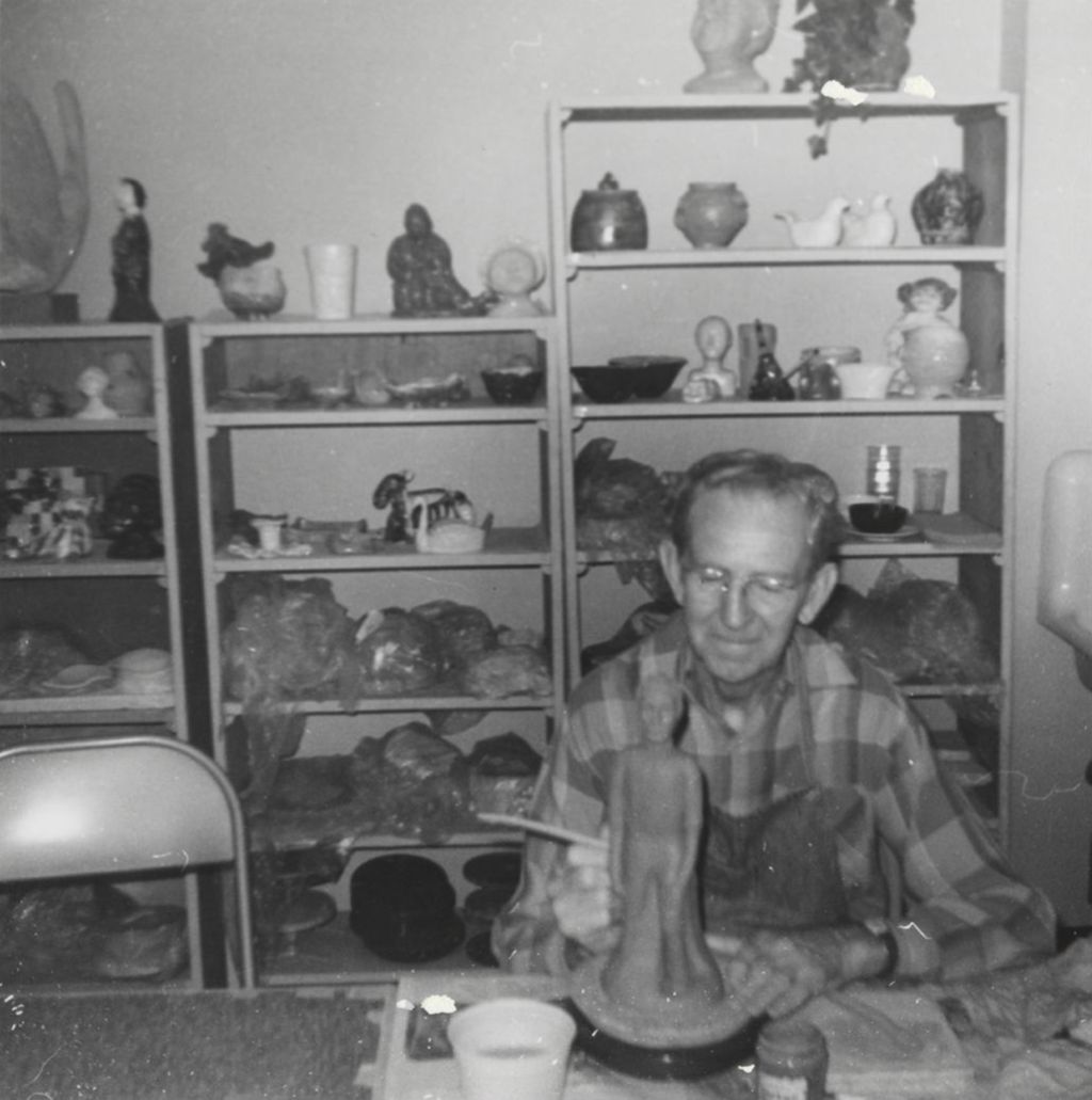 Miniature of Senior man working on a large clay figurine in a class at the Mary Pomeroy Green Center