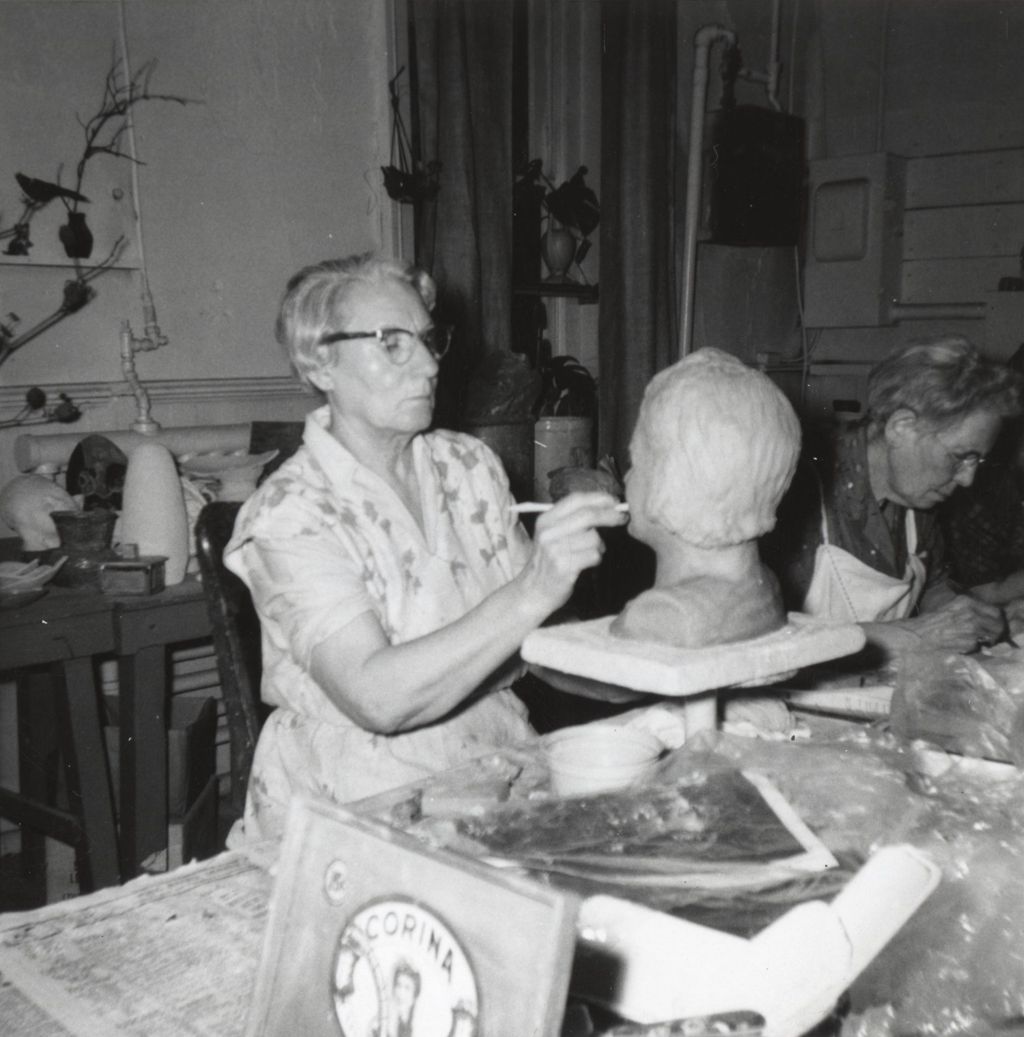 Miniature of Senior woman working on a clay bust