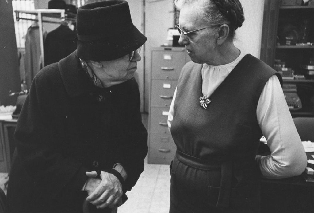 Two women at a senior center affiliated with Hull-House